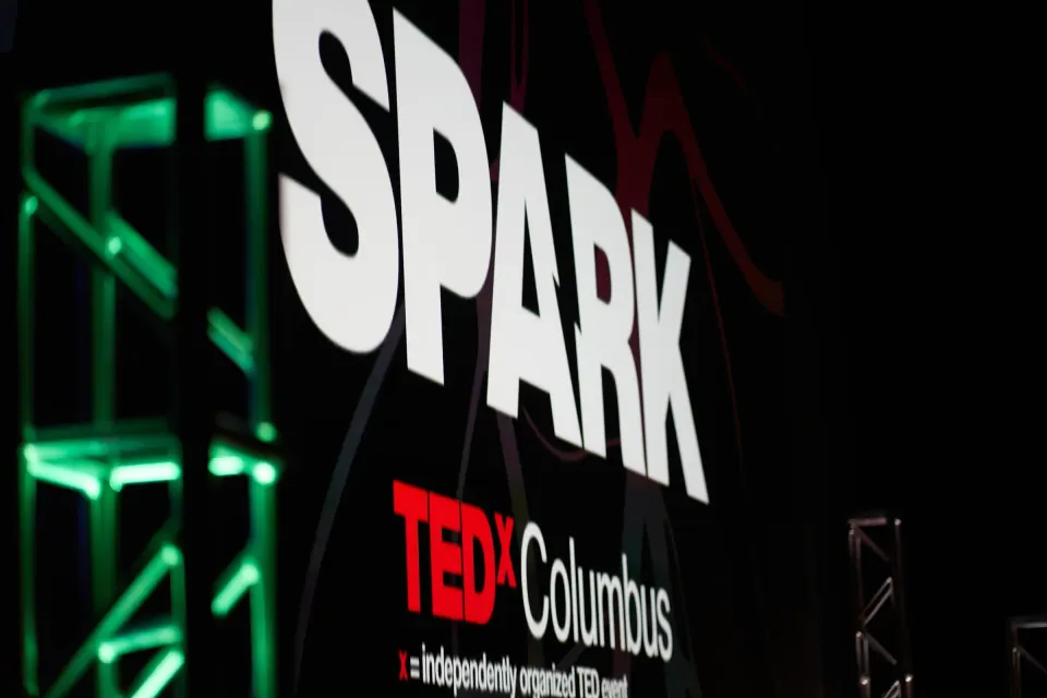SPARK lettering glowing on the set