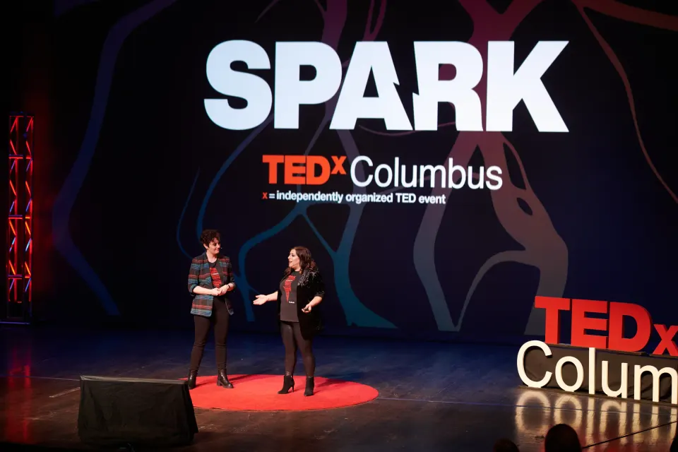 Two speakers on the TEDxColumbus stage
